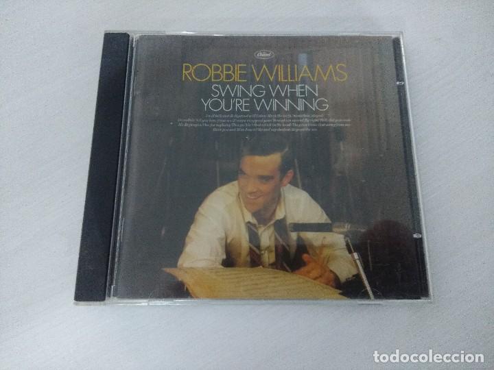 CDs de m&uacute;sica: CD/ROBBIE WILLIAMS/SWING WHEN YOURE WINNING. - Foto 1