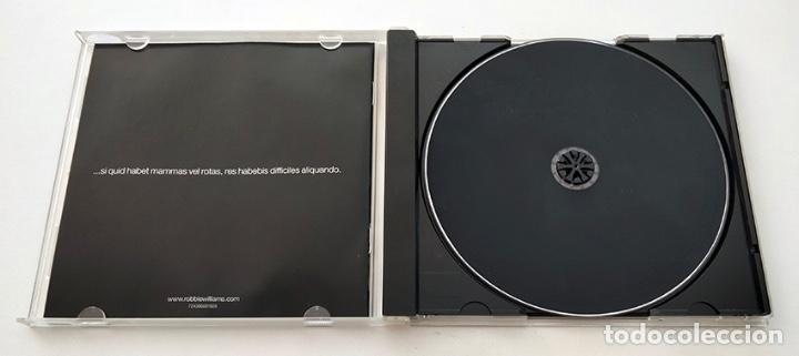 CDs de m&uacute;sica: CD DE ROBBIE WILLIAMS. GREATEST HITS. 2004. COMO NUEVO. - Foto 3