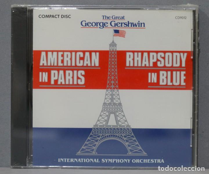 Music CDs: CD. The Great George Gershwin. AMERICAN IN PARIS. RHAPSODY IN BLUE. PRECINTADO