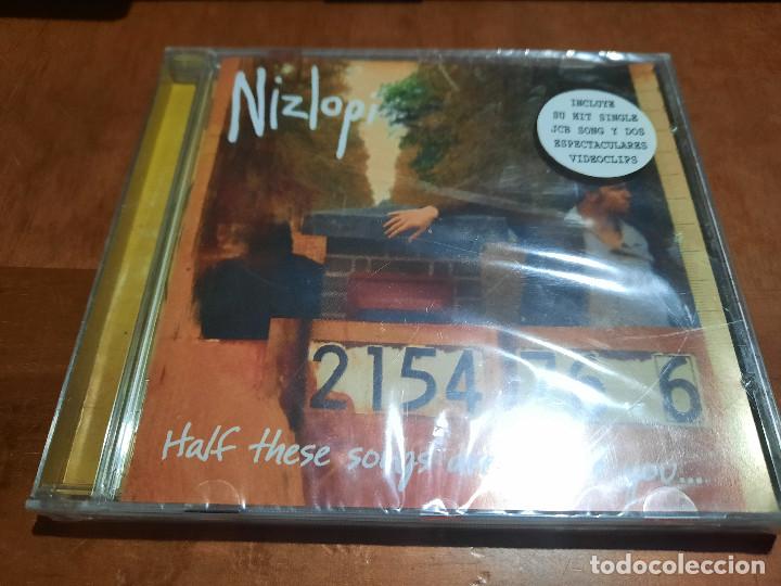 Music CDs: NIZLOPI. HALF THESE SONGS ARE ABOUT YOU ... CD CON 11 TEMAS. PRECINTADO. SIN ABRIR