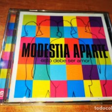 CDs de Música: MODESTIA APARTE ESTO DEBE SER AMOR CD ALBUM AÑO 2004 MIKEL ERENTXUN DAVID SUMMERS JOSE MANUEL CASAÑ