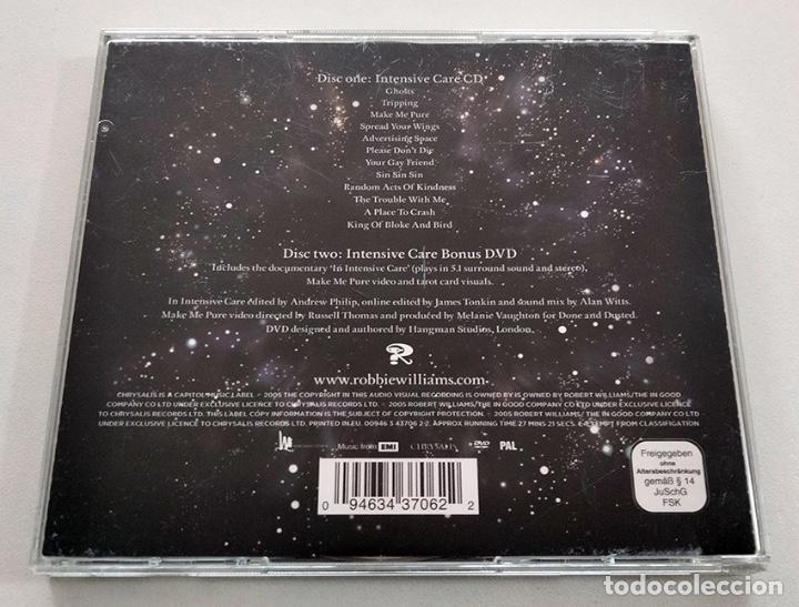 CDs de m&uacute;sica: CD Y DVD ROBBIE WILLIAMS. INTENSIVE CARE. COMO NUEVO. - Foto 2