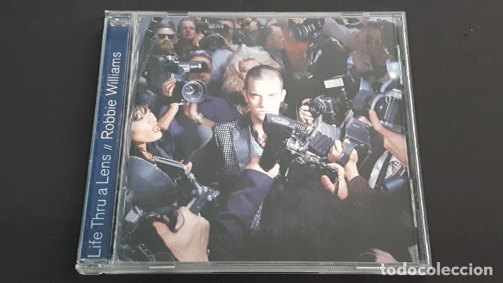CDs de m&uacute;sica: CD ROBBIE WILLIAMS - LIFE THRU A LENS - Foto 1
