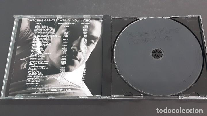 CDs de m&uacute;sica: CD ROBBIE WILLIAMS - GREATEST HITS - Foto 2