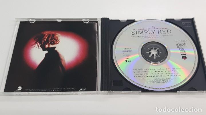 CDs de m&uacute;sica: CD SIMPLY RED - A NEW FLAME - Foto 2