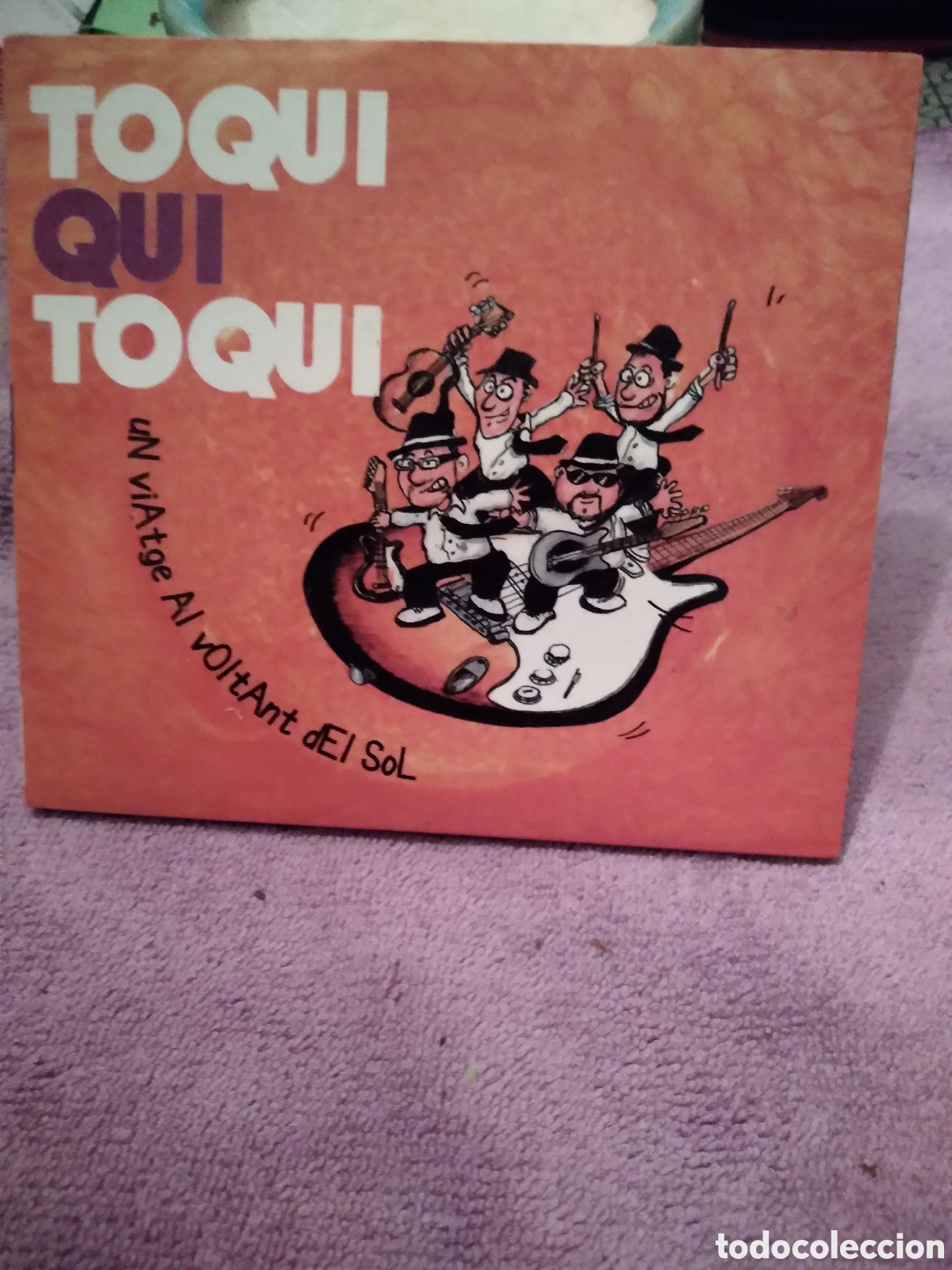 CDs de m&uacute;sica: TOQUI QUI TOQUI-UN VIATGE AL VOLTANT DEL SOL-CD-