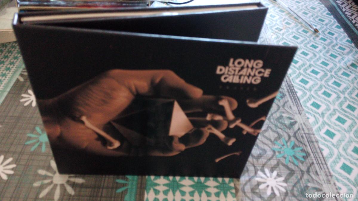 CDs de m&uacute;sica: Long Distance Calling &lrm;&ndash; Eraser CD+LIBRO TAPAS DURAS - Foto 2