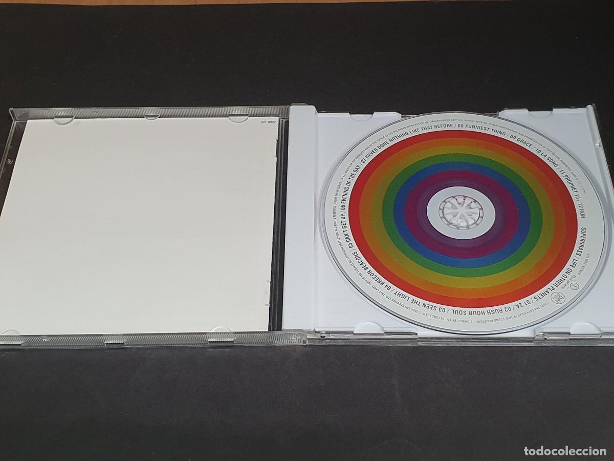 CDs de m&uacute;sica: CD SUPERGRASS - LIFE ON OTHER PLANETS - 2002 - Foto 2