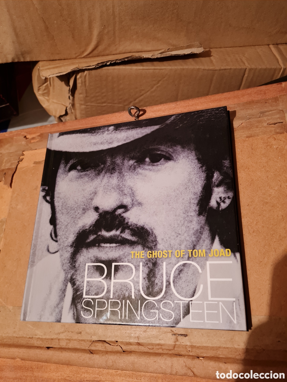 CDs de m&uacute;sica: LIBRO Y CD BRUCE SPRINGSTEEN. THE GHOST OF TOM JOAD - Foto 1