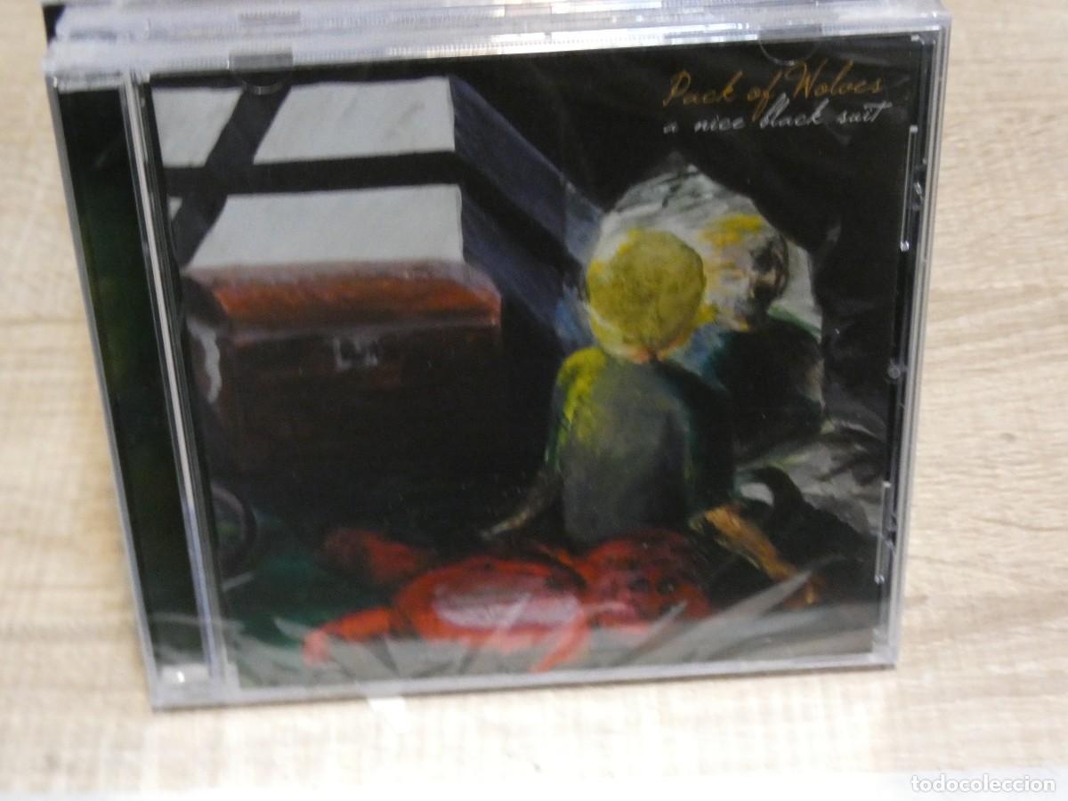 CD di Musica: ARKANSAS1980 lott214 cd buen estado nuevo a estrenar Jebi garrulo PACK OF WOLVES A NICE BLACK SUIT