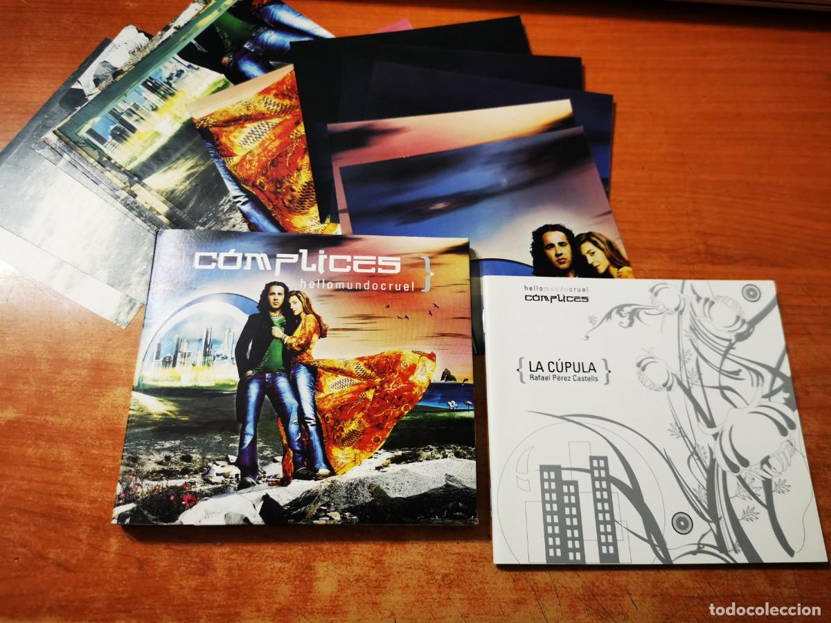 CD de M&uacute;sica: COMPLICES Hello mundo cruel CD ALBUM DIGIPACK 15 POSTALES QUE FORMAN UN POSTER + FOLLETO