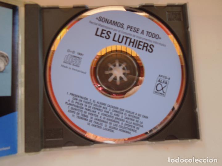 CDs de m&uacute;sica: SONAMOS PESE A TODO - LES LUTHIERS - CD - Foto 2