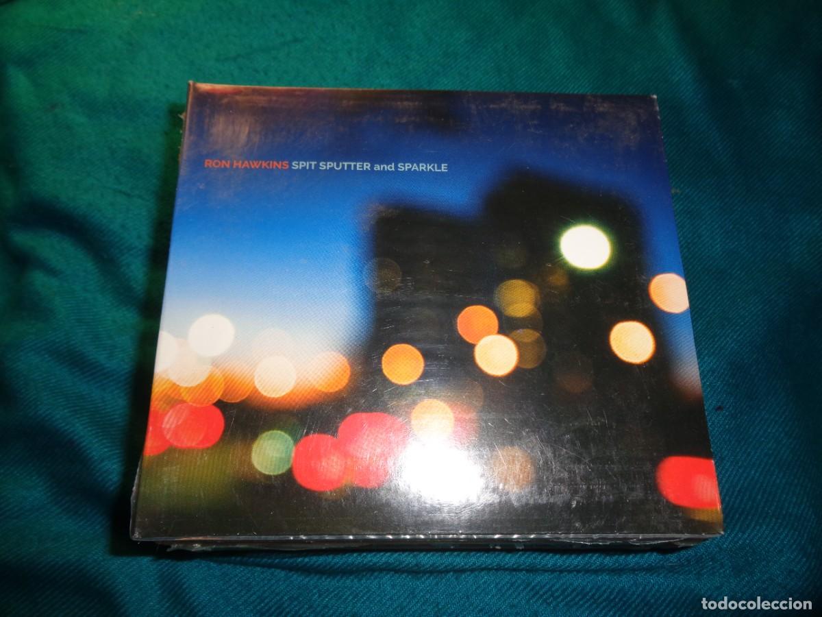 CDs de m&uacute;sica: RON HAWKINS. SPIT SPUTTER AND SPARKLE. CD DIGIPACK. PRECINTADO(#)