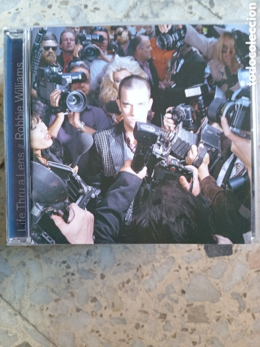 CDs de m&uacute;sica: CD ROBBIE WILLIAMS LIFE THRU A LENS - Foto 1