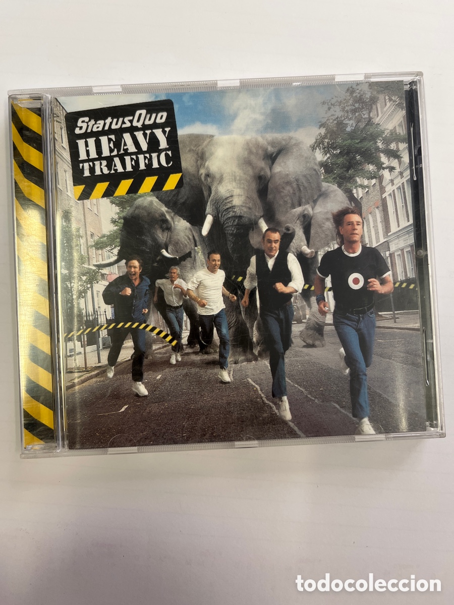CDs de m&uacute;sica: STATUS QUO. HEAVY TRAFFIC. CD - Foto 1