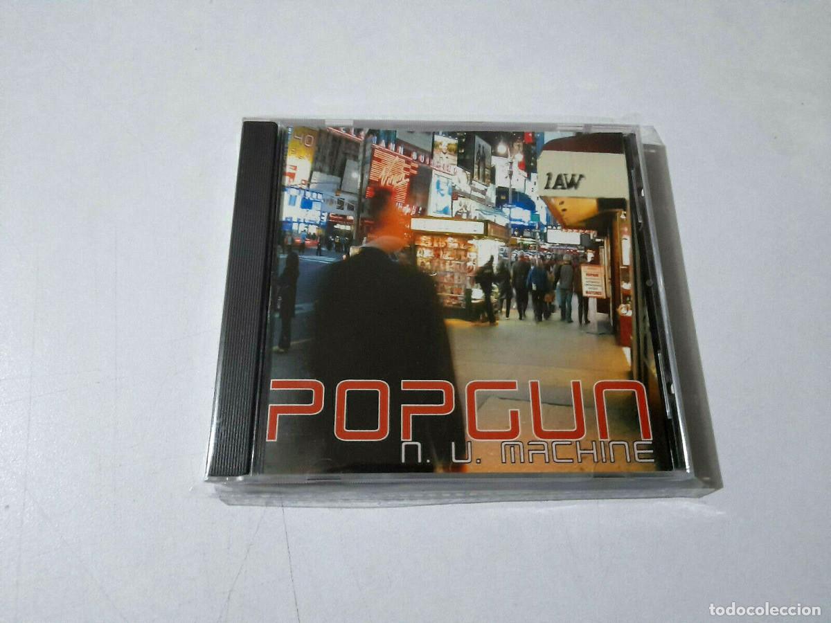CDs de m&uacute;sica: POPGUN &rdquo;N.U. MACHINE&rdquo; CD 11 TRACKS - Foto 1
