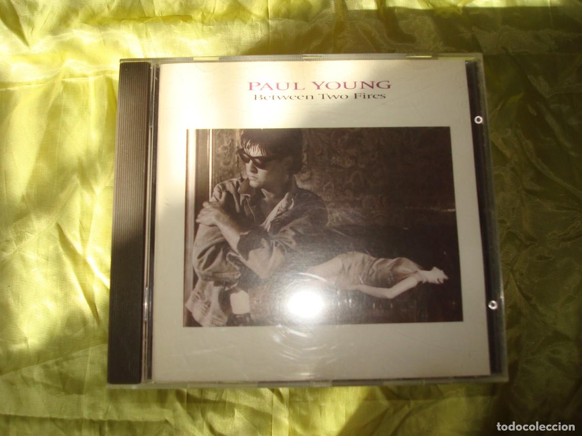 CDs de m&uacute;sica: PAUL YOUNG. BETWEEN TWO FIRES. CD. IMPECABLE - Foto 1