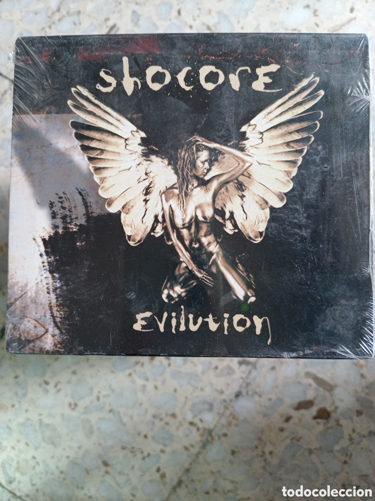 CDs de m&uacute;sica: CD SHOCORE EVILUTION NUEVO PRECINTADO - Foto 1
