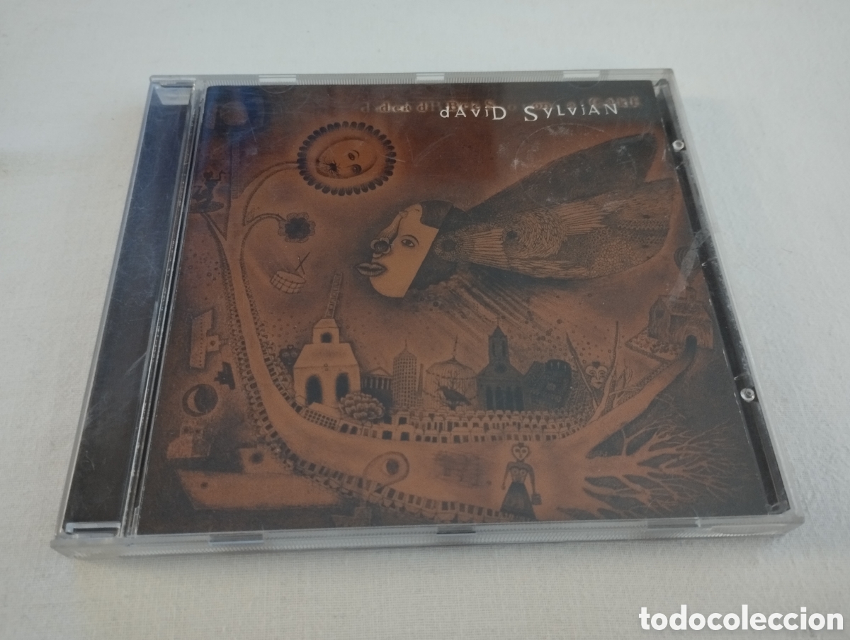 CDs de m&uacute;sica: DAVID SYLVIAN. DEAD BEES ON A CAKE (CD) - Foto 1