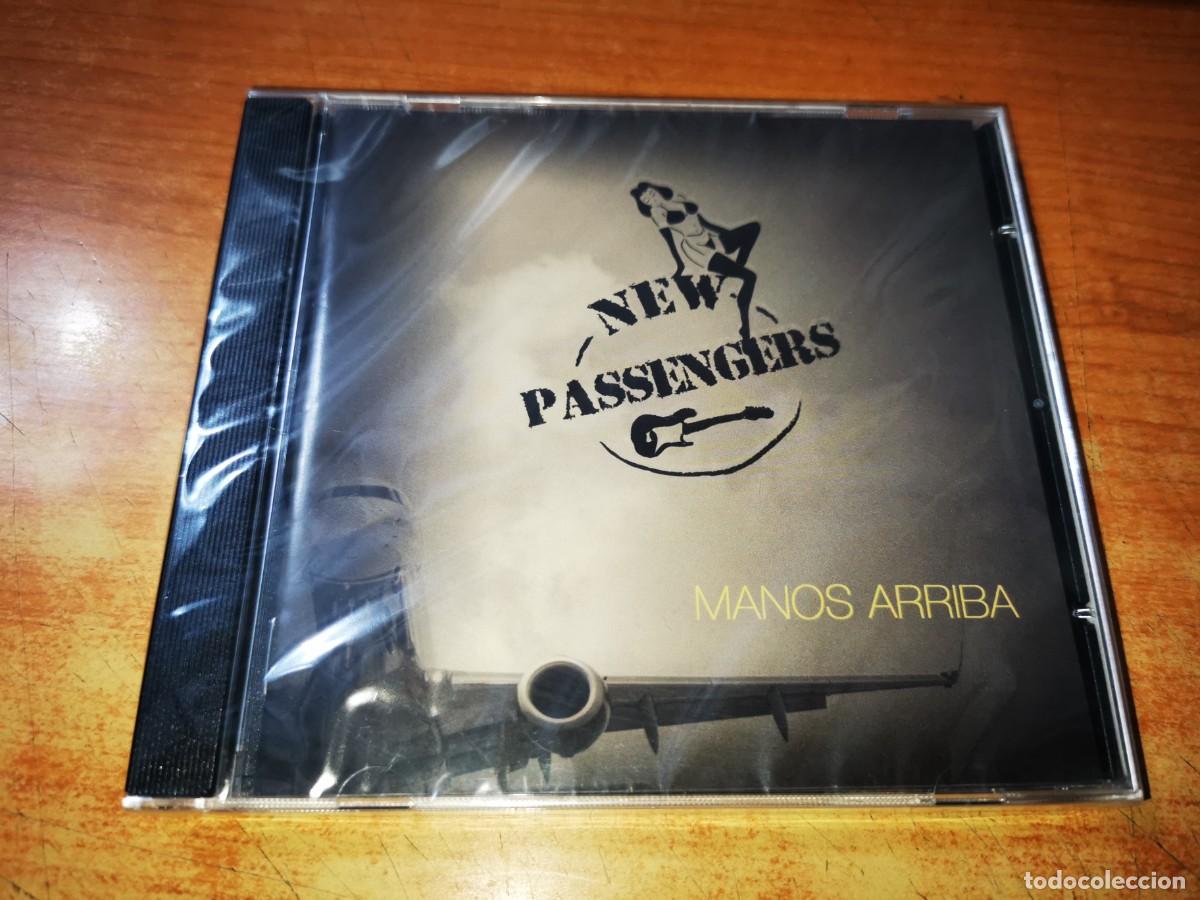 CD de M&uacute;sica: NEW PASSENGERS Manos arriba CD ALBUM PRECINTADO CONTIENE 10 TEMAS