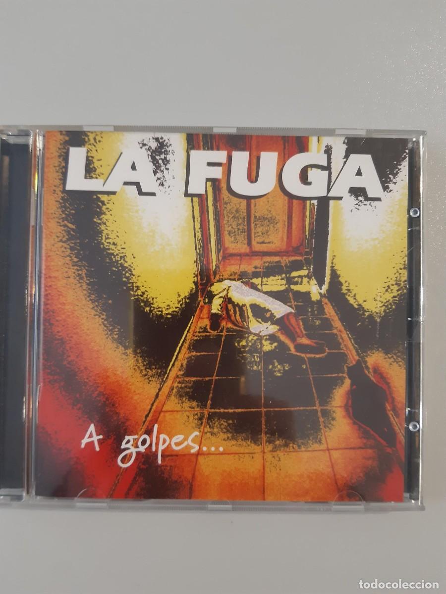 CDs de m&uacute;sica: CD LA FUGA - A GOLPES DE ROCK & ROLL cd - Foto 1