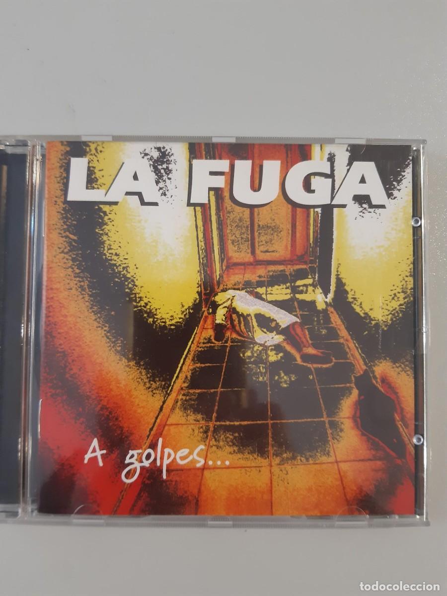 CDs de m&uacute;sica: CD LA FUGA - A GOLPES DE ROCK & ROLL cd - Foto 3