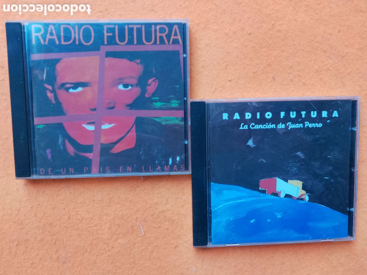 CDs de M&uacute;sica: LOTE 2 DISCOS RADIO FUTURA .UN PAIS EN LLAMAS - LA CANCI&Oacute;N DE JUAN PERRO. 2 CAJAS VACIAS . SIN CD