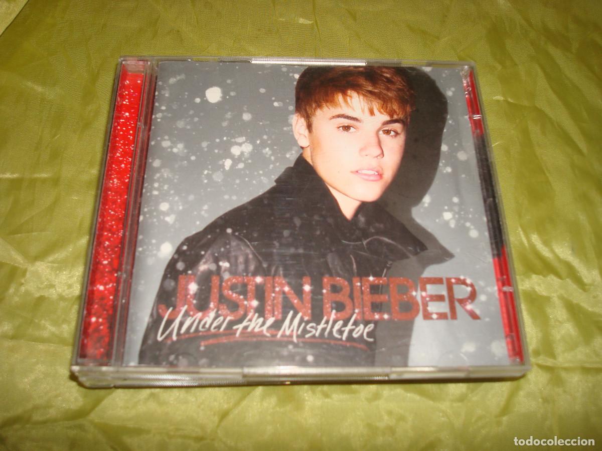 CDs de m&uacute;sica: JUSTIN BIEBER. UNDER THE MISTLETOE. CD + DVD - Foto 1