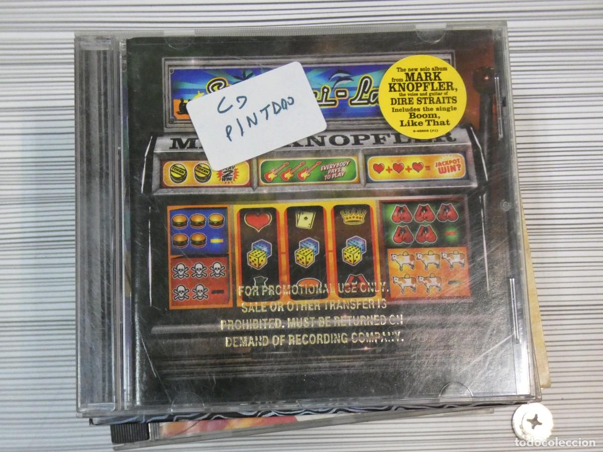 Musik-CDs: ARKANSAS1980 CAJJ636 CD DESTROZADO A TU RIESGO - Mark Knopfler CD PINTADO