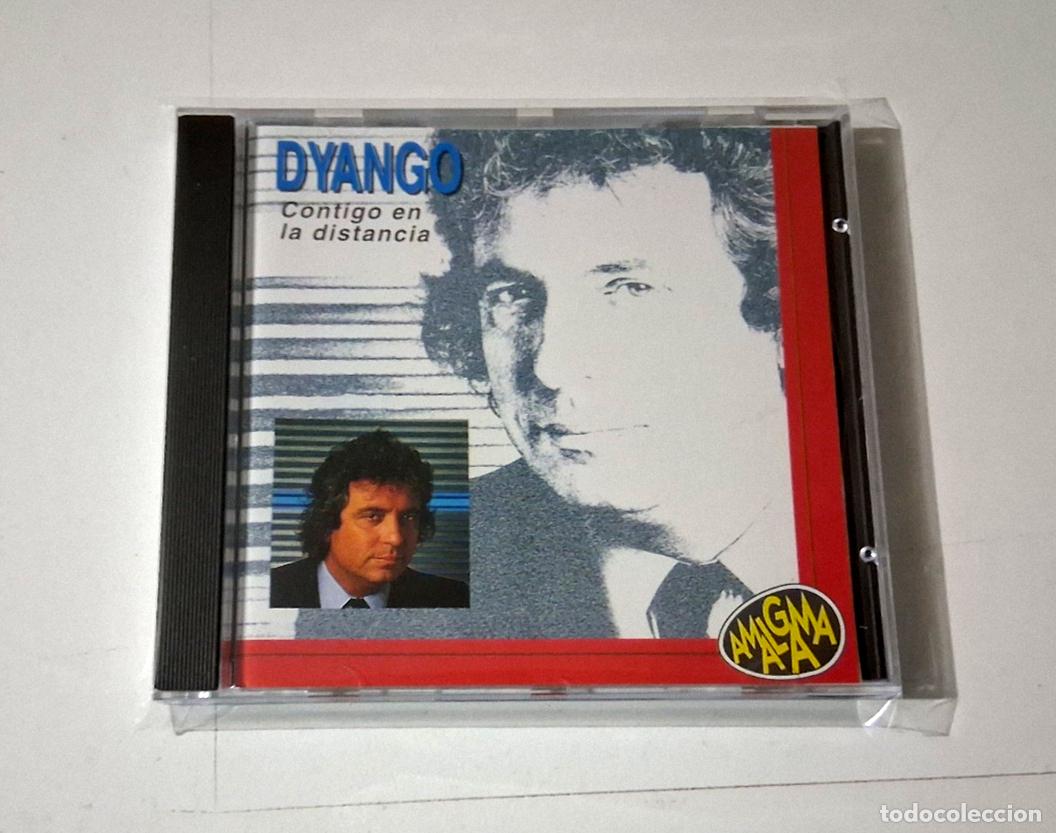 CDs de m&uacute;sica: DYANGO &rdquo;CONTIGO EN LA DISTANCIA&rdquo; CD 8 TRACKS COMO NUEVO - Foto 1