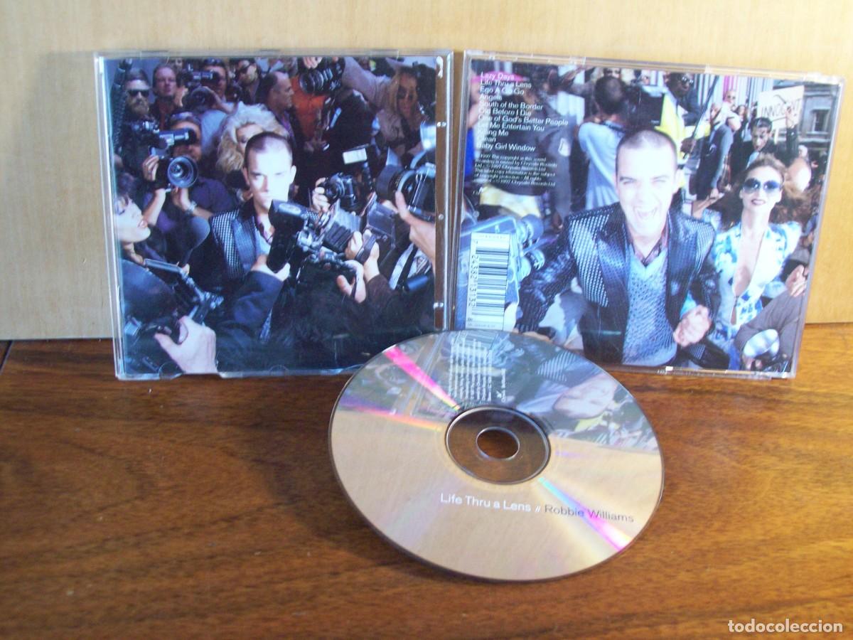 CDs de m&uacute;sica: ROBBIE WILLIAMS - LIFE THRU A LENS - CD - Foto 1