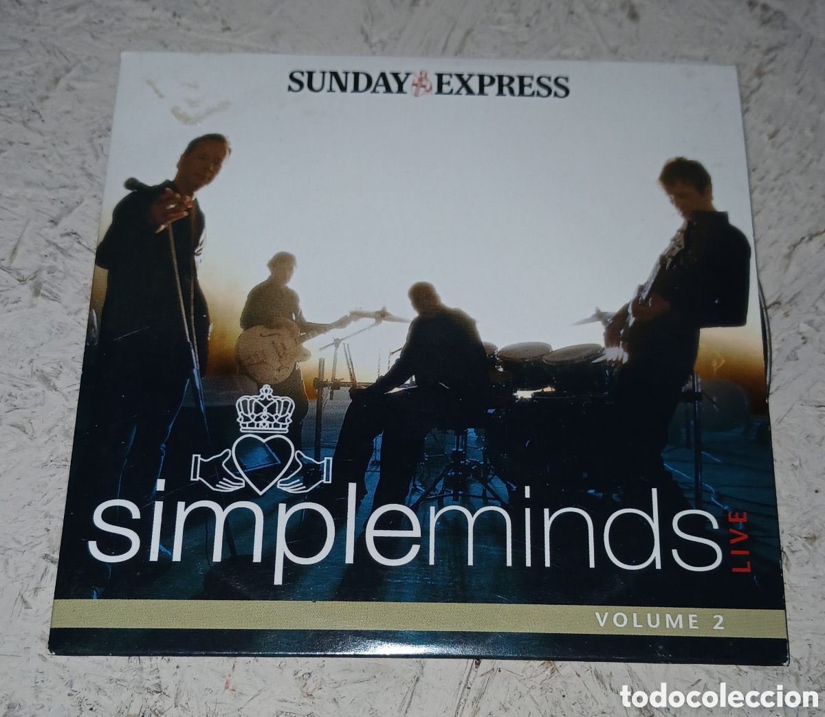 CDs de M&uacute;sica: CD coleccionable titulado &rdquo;Simple Minds &ndash; Live - Volume 2&rdquo;.