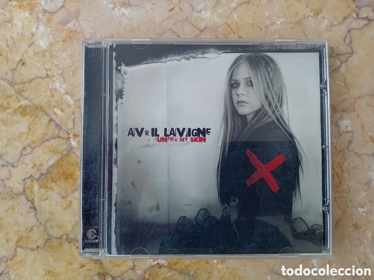 CDs de M&uacute;sica: AVRIL LAVIGNE - UNDER MY SKIN - 12 TRACKS - ED. ARISTA /BMG RECORDS - A&Ntilde;O 2004.