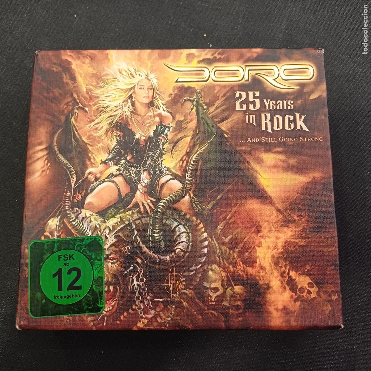 CDs de M&uacute;sica: DORO/25 YEARS IN ROCK.......AND STILL GOING STRONG/DVD 2 DISCOS + CD+ LIBRO METAL.