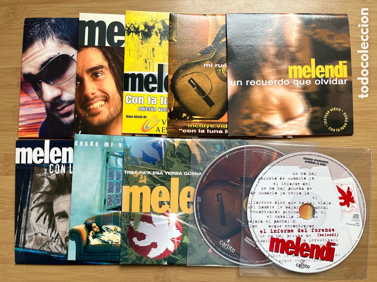CDs de M&uacute;sica: MELENDI. Con la luna llena. Un recuerdo que olvidar. Trae pa'k esa yerba guena.......(10 cds single)