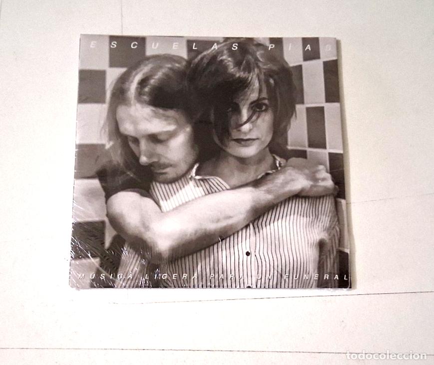 CDs de M&uacute;sica: ESCUELAS PIAS &rdquo;MUSICA LIGERA PARA UN FUNERAL&rdquo; CD 10 TRACKS PRECINTADO SEALED CAR