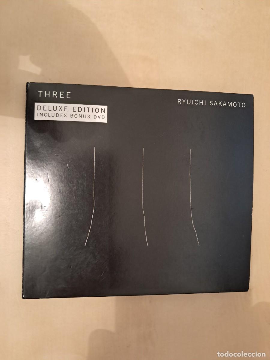 CDs de M&uacute;sica: Ryuichi Sakamoto , Three , CD+DVD 2013 . Impecable. Clasica Contempor&aacute;nea.