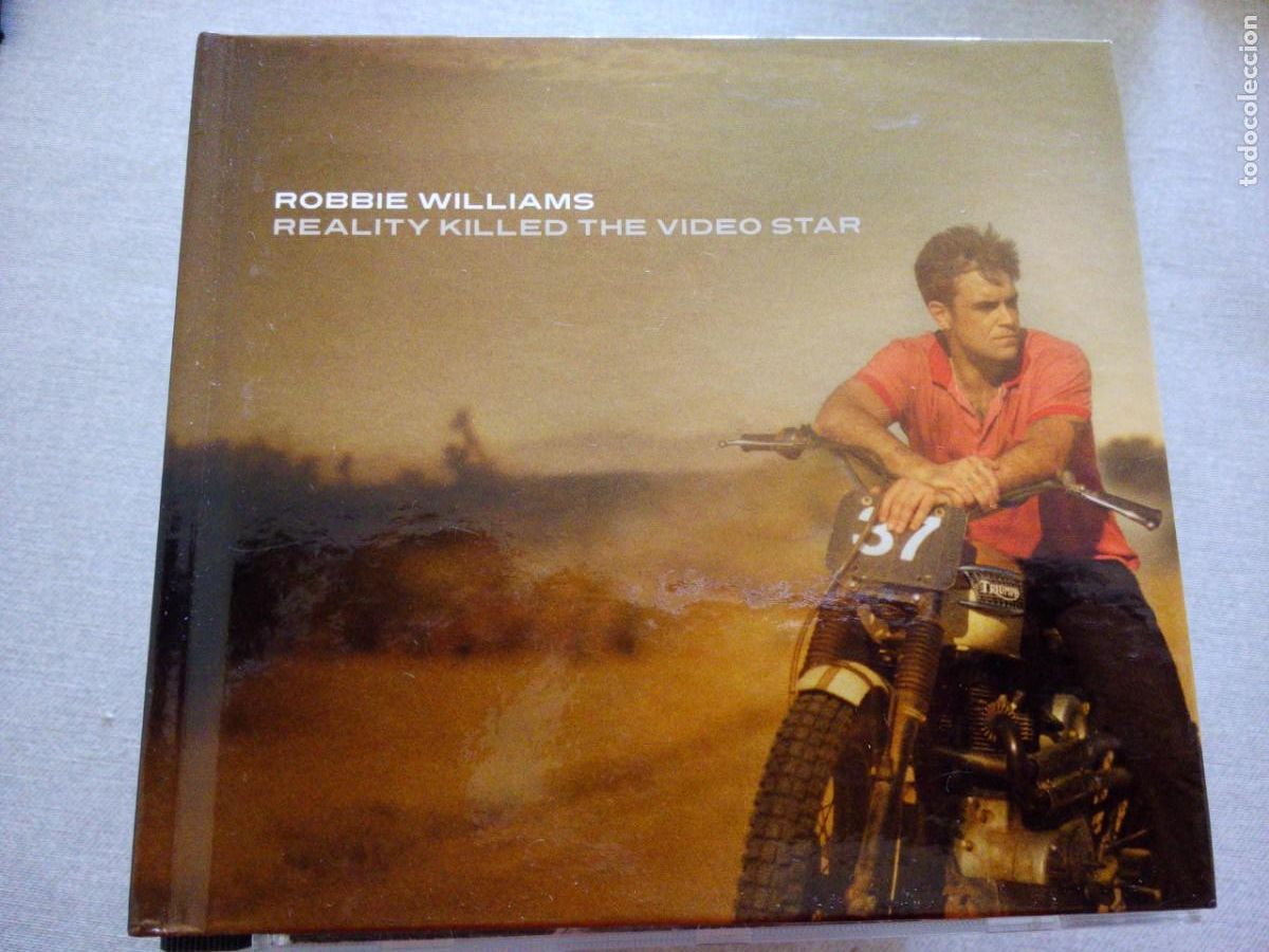CDs de M&uacute;sica: ROBBIE WILLIAMS REALITY KILLED THE VIDEO STAR CD+DVD LIBRO
