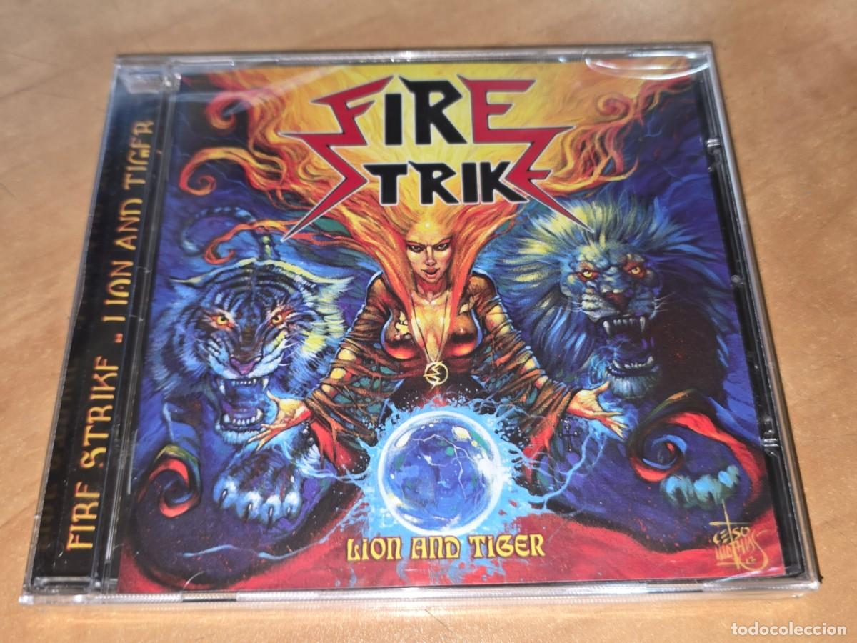 CDs de M&uacute;sica: FIRE STRIKE CD Lion and Tiger,2014 *PRECINTADO* Heavy Metal con voz Femenina -Saratoga-Oker