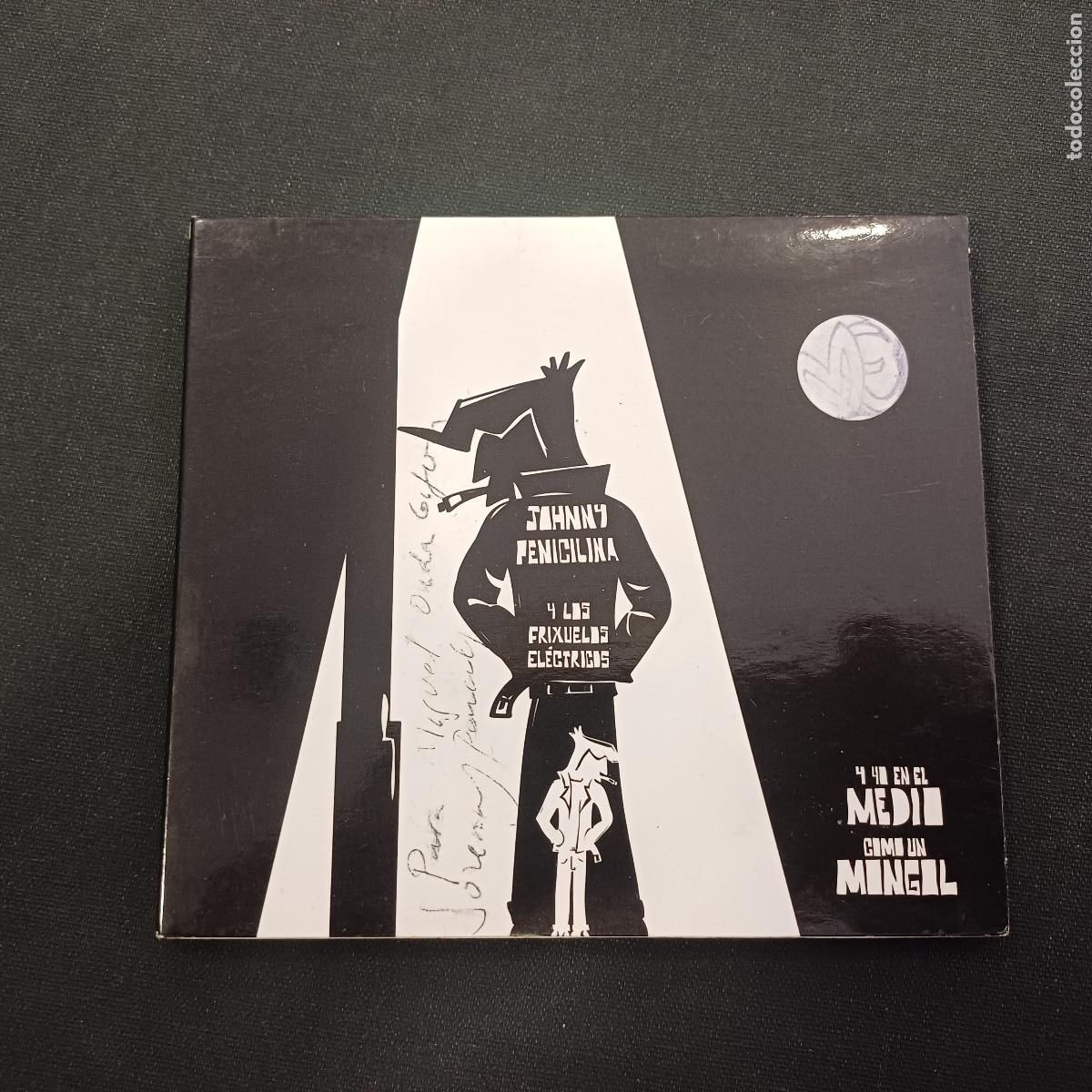 CDs de M&uacute;sica: JOHNNY PENICILINA Y LOS FRIXUELOS ELECTRONICOS/Y YO EN EL MEDIO COMO UN MONGOL/CD DIGIPACK FIRMADO.