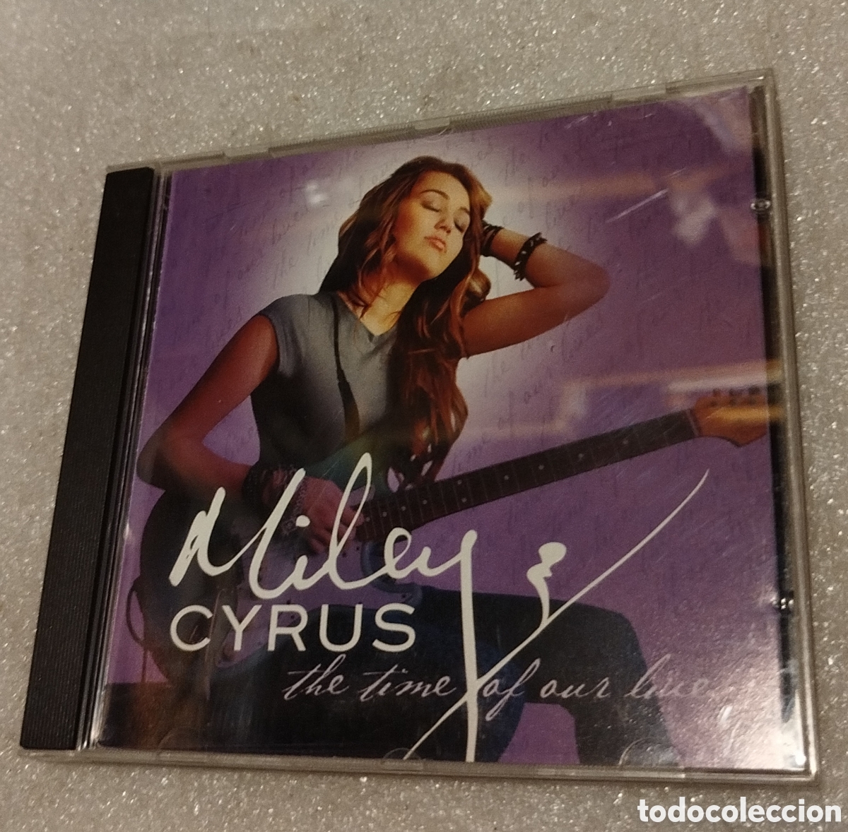 CDs de M&uacute;sica: Miley Cyrus &ndash; The Time Of Our Lives.