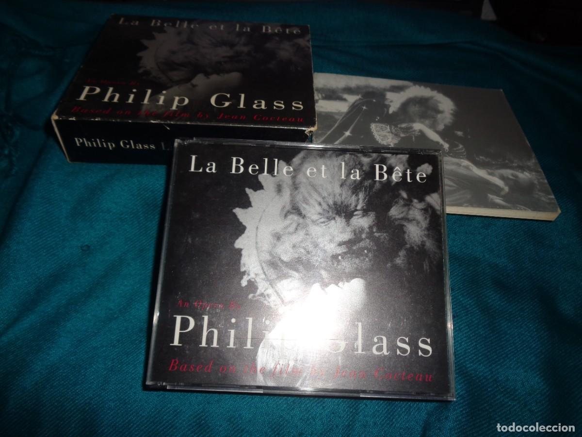 CDs de M&uacute;sica: PHILIP GLASS. LA BELLE ET LA BETE. 2 CD&acute;S + LIBRO.(#)
