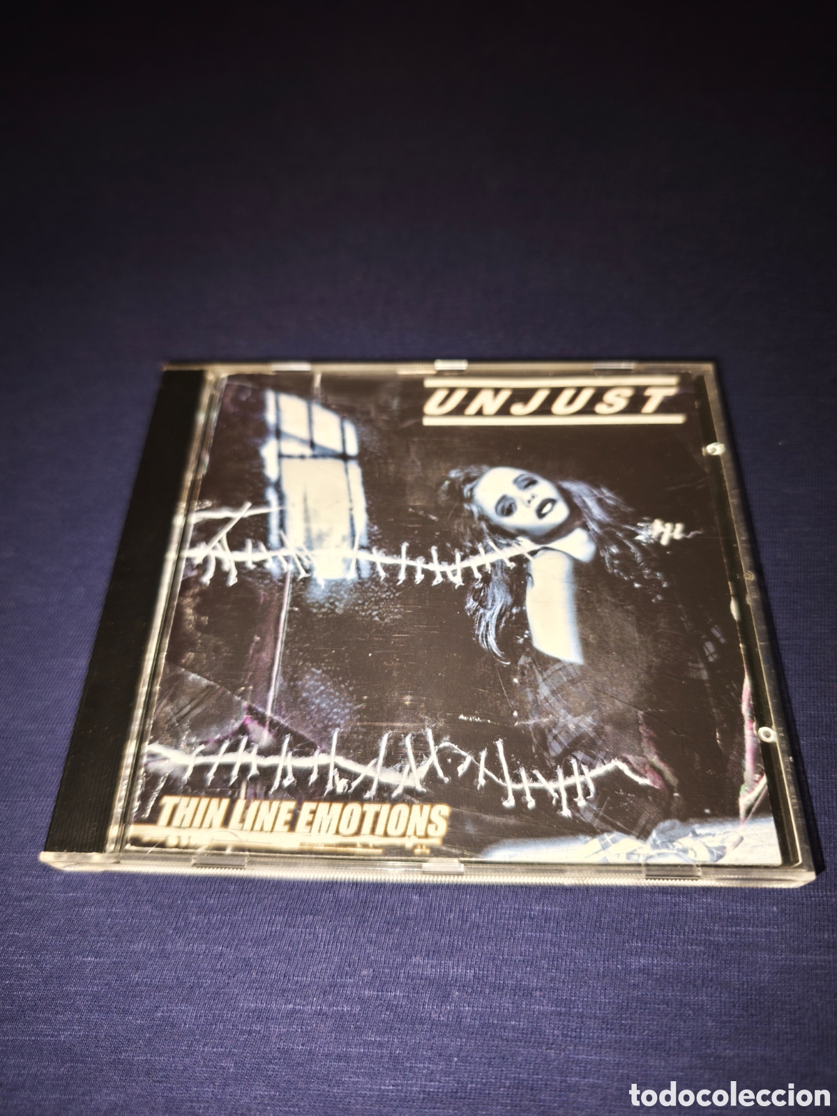 CDs de M&uacute;sica: Unjust Thin line emotions