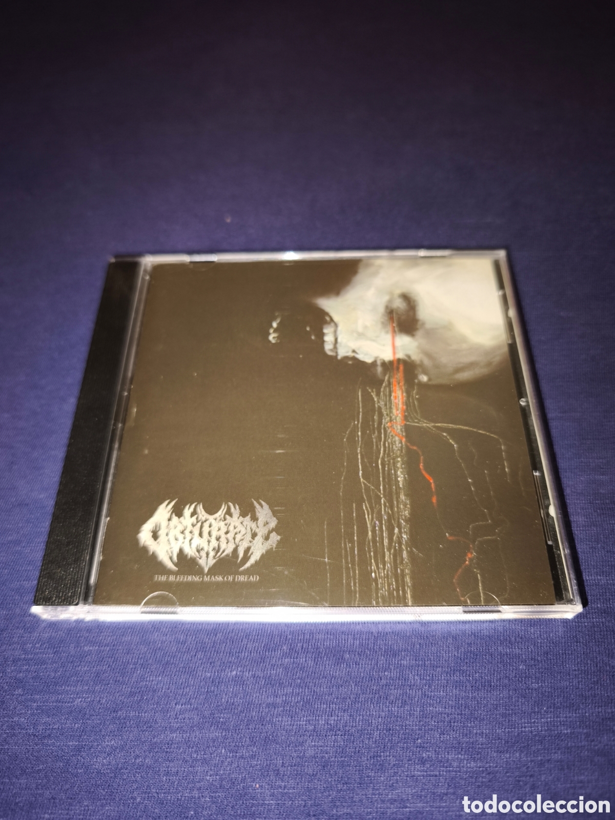 CDs de m&uacute;sica: Obturate The Bleeding Mask of dread