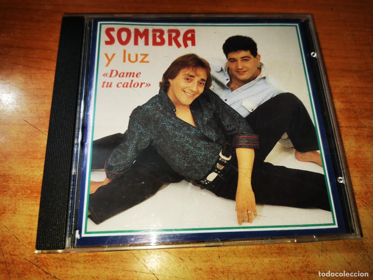 CDs de m&uacute;sica: SOMBRA Y LUZ Dame tu calor CD ALBUM DEL A&Ntilde;O 1994 CONTIENE 11 TEMAS