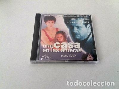 CDs de m&uacute;sica: Una casa en las afueras- 8427064010042
