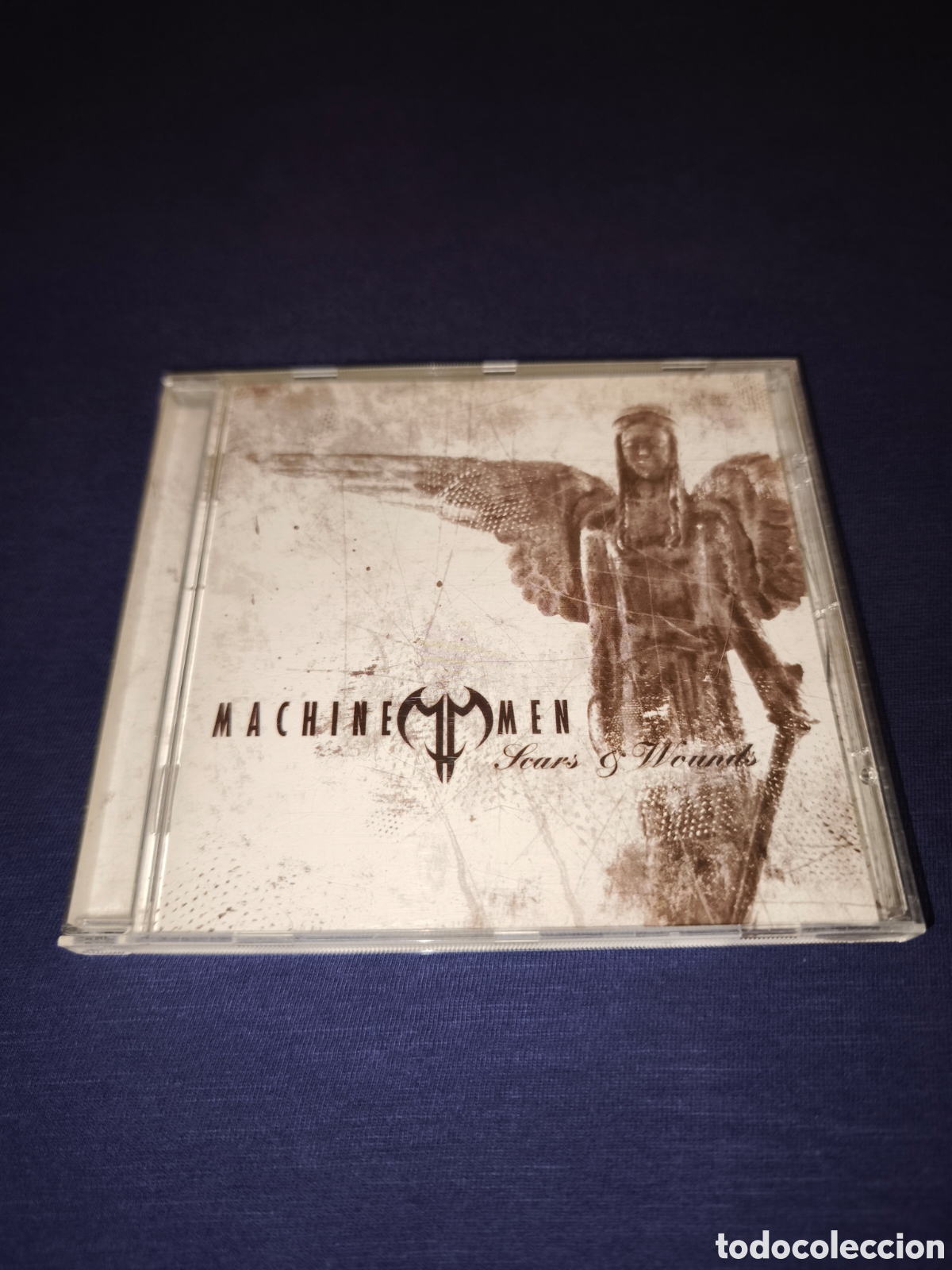 CDs de m&uacute;sica: Machine Men Scars & Wounds