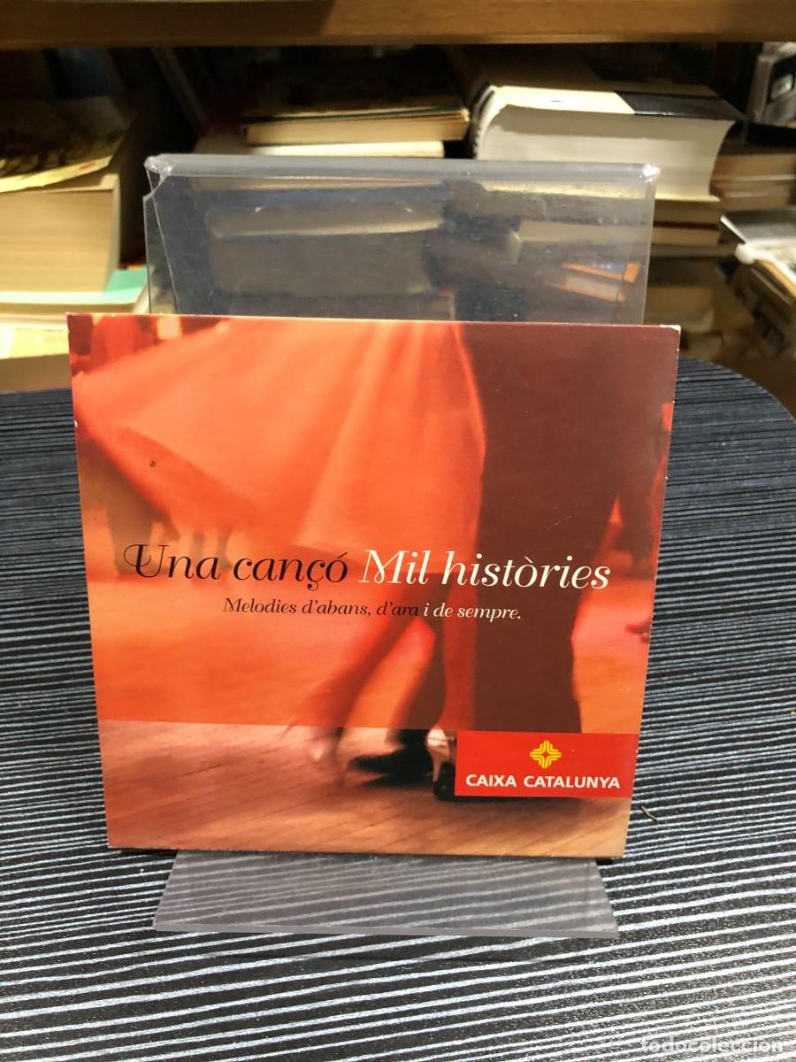 CDs de m&uacute;sica: Una can&ccedil;&oacute;, Mil hist&ograve;ries (Melodies d'abans, d'ara i de sempre) Caixa Catalunya (CD Promocional)