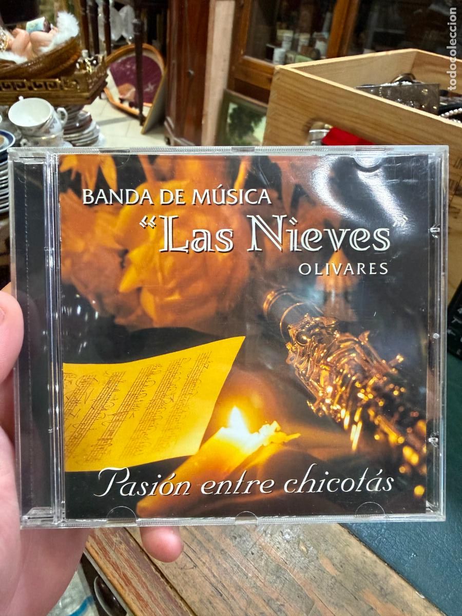 CDs de m&uacute;sica: CD BANDA LAS NIEVES DE OLIVARES - PASION ENTRE CHICOTAS - SEMANA SANTA SEVILLA