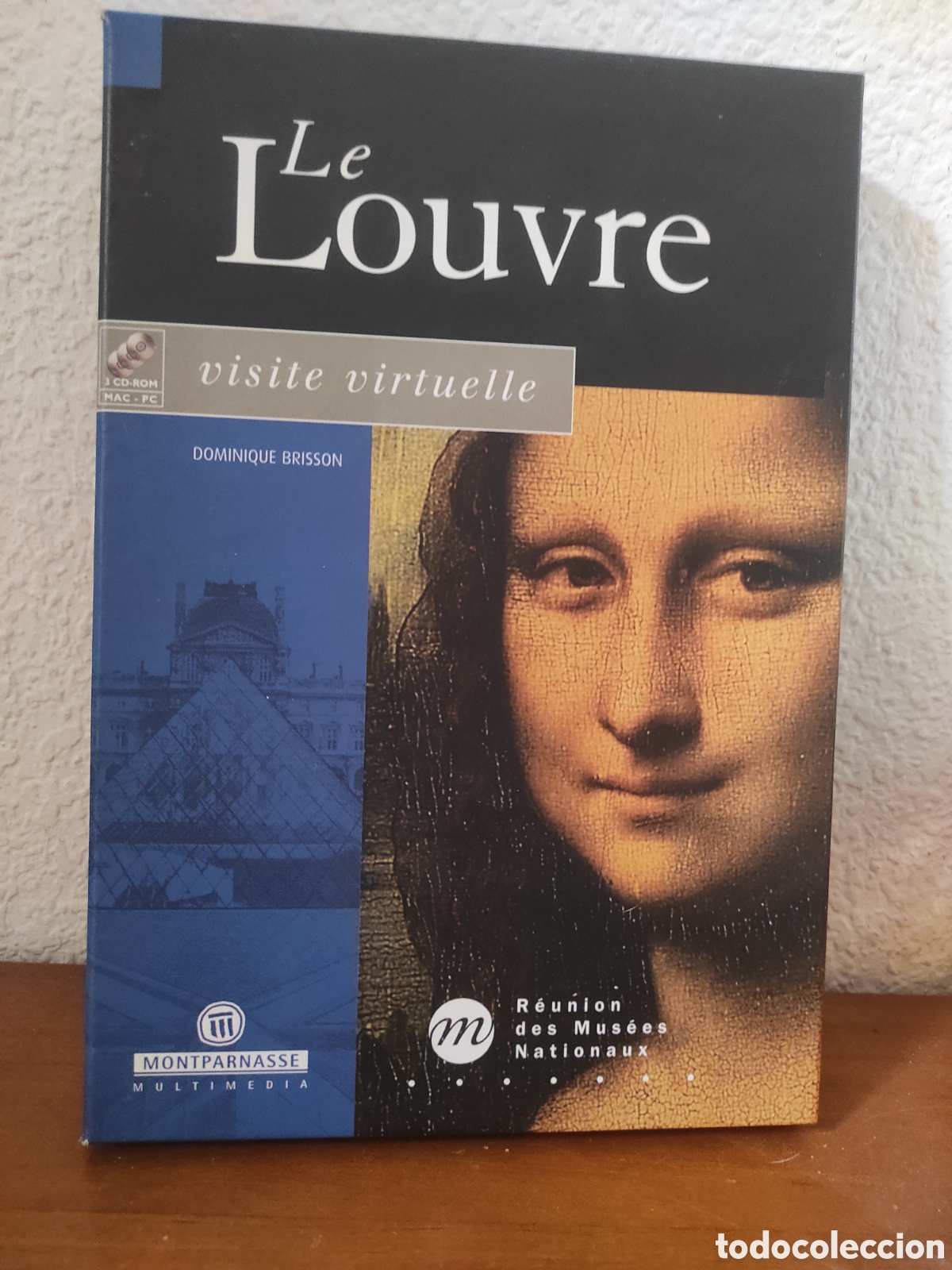 CDs de m&uacute;sica: 3 CD-ROMs titulado &rdquo;Le Louvre: visite virtuelle&rdquo;, una exploraci&oacute;n interactiva del famoso museo